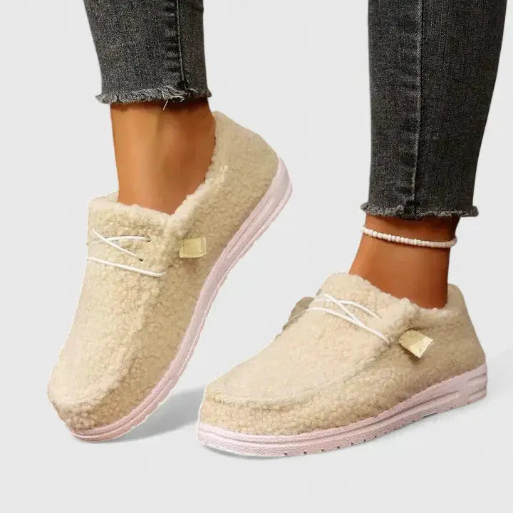 Wilfred Smith women's orthopedic flats pair: beige shearling loafers with cushioned footbed and pink sole