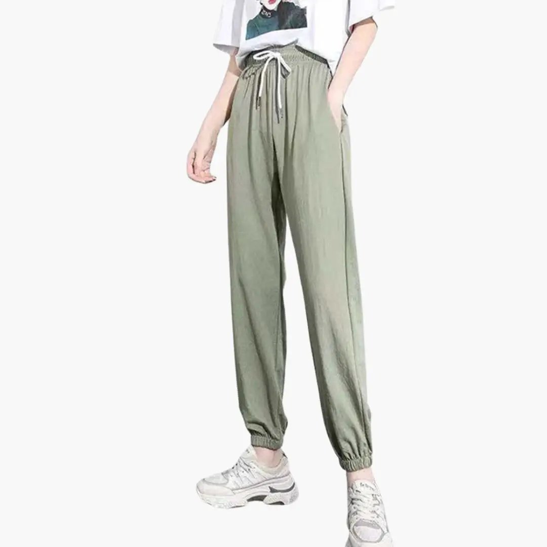 Women's jogging pants in olive green with a drawstring waistband and cuffed ankles