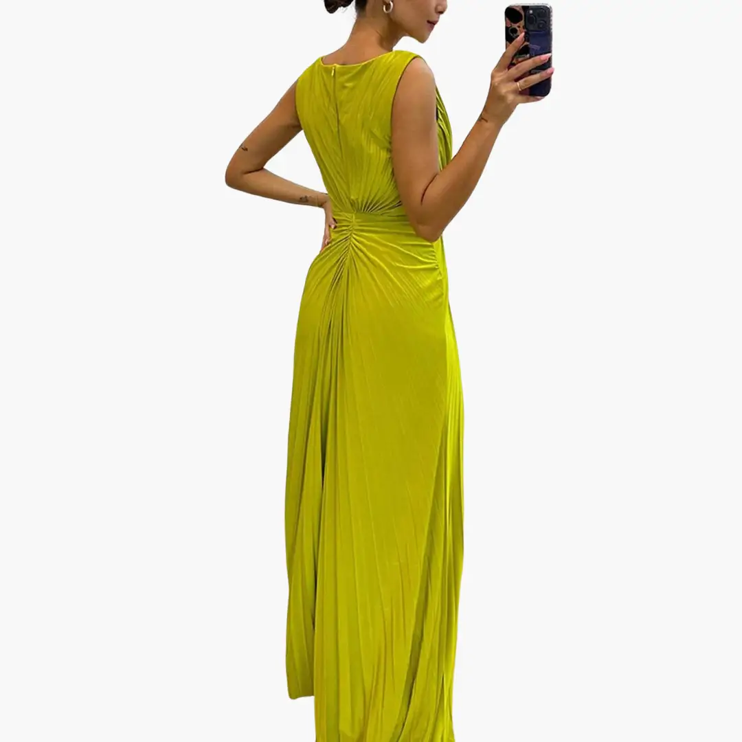 Pleated maxi dress with slit by Wilfred Smith in lime yellow, back view evening gown