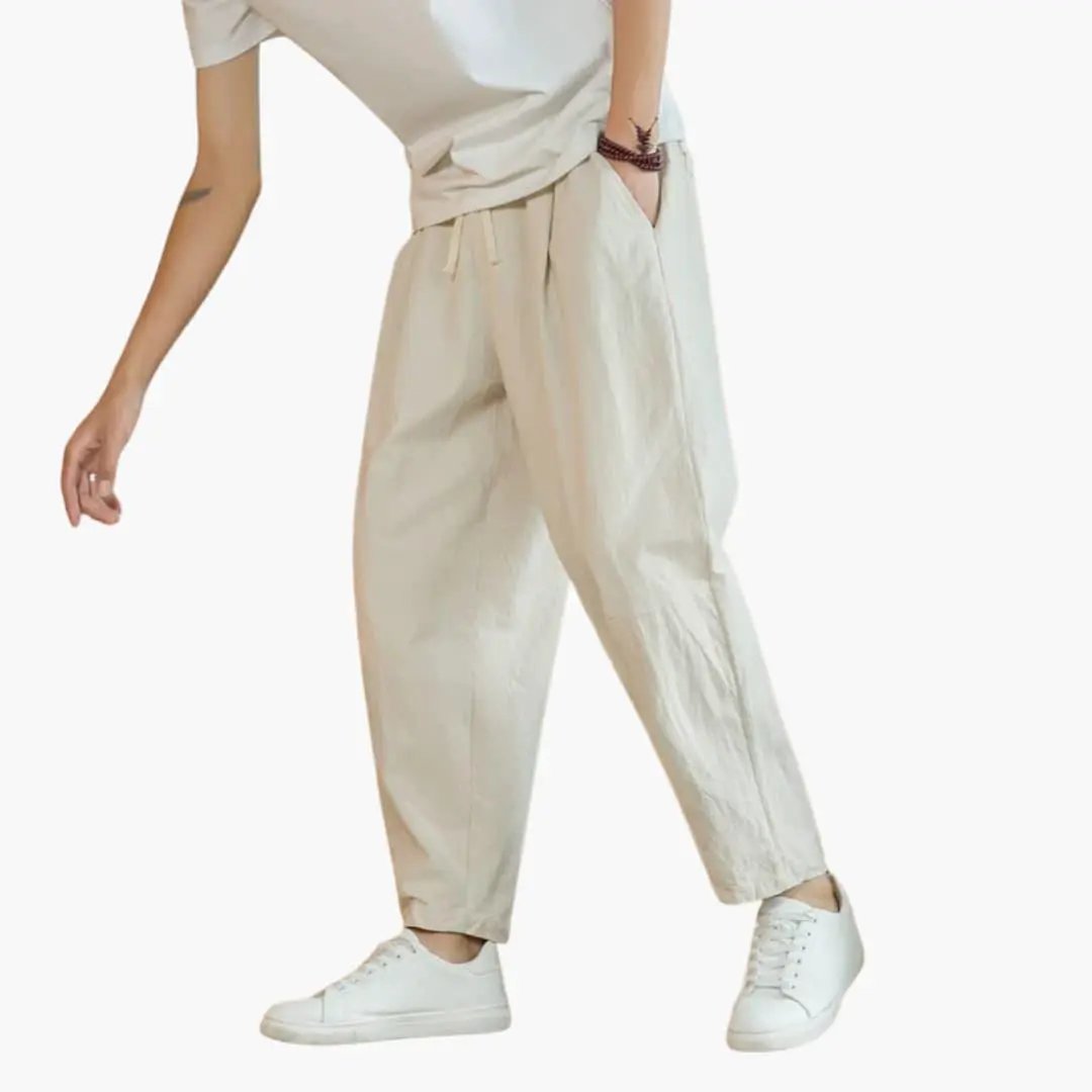 Comfortable pants for men by Wilfred Smith in beige, relaxed-fit leisure trousers with drawstring.