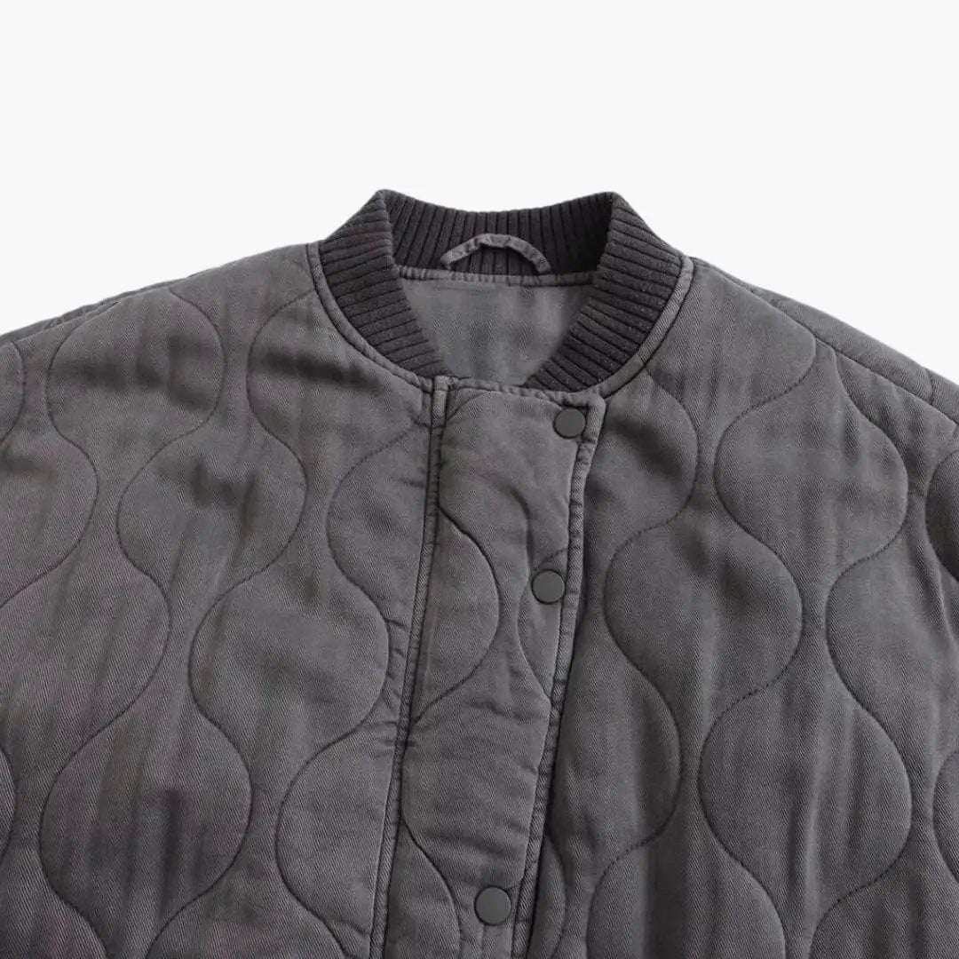 Wilfred Smith loose-fit bomber jacket for women in dark gray quilted fabric with a ribbed collar