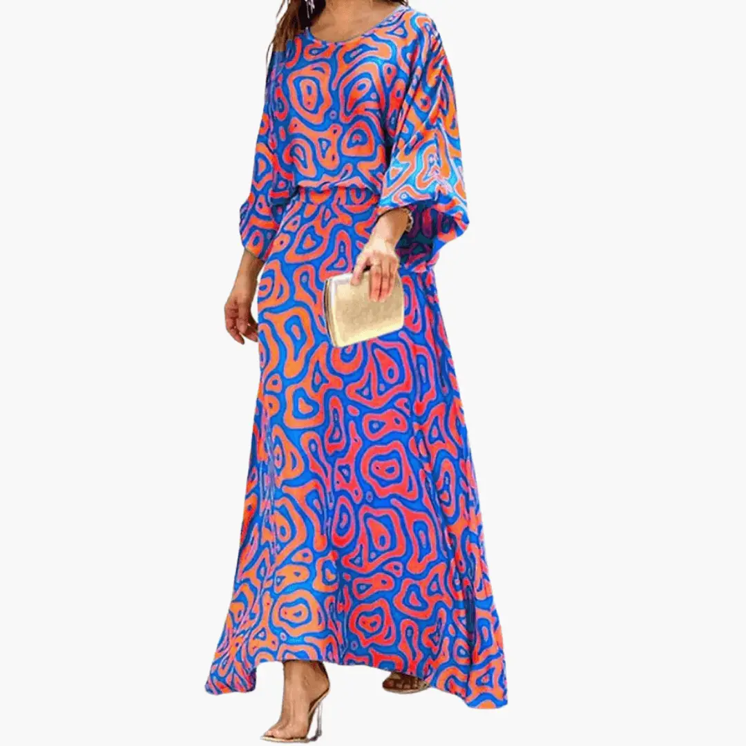 Women's Maxi Dress with Print in blue and orange boho pattern, with beige clutch