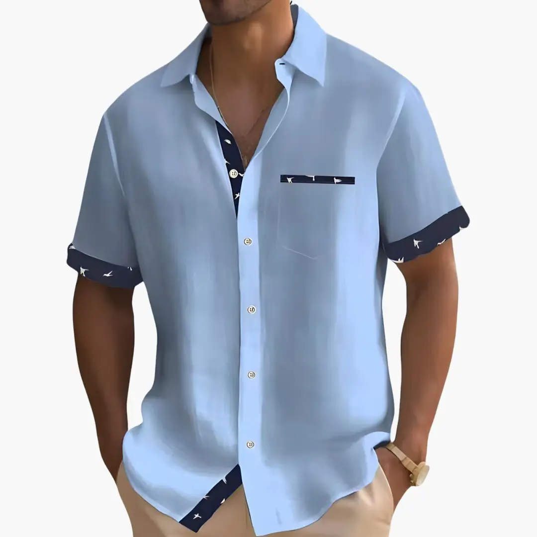 Men's modern slim-fit shirt, light blue with navy rolled cuffs and pocket trim