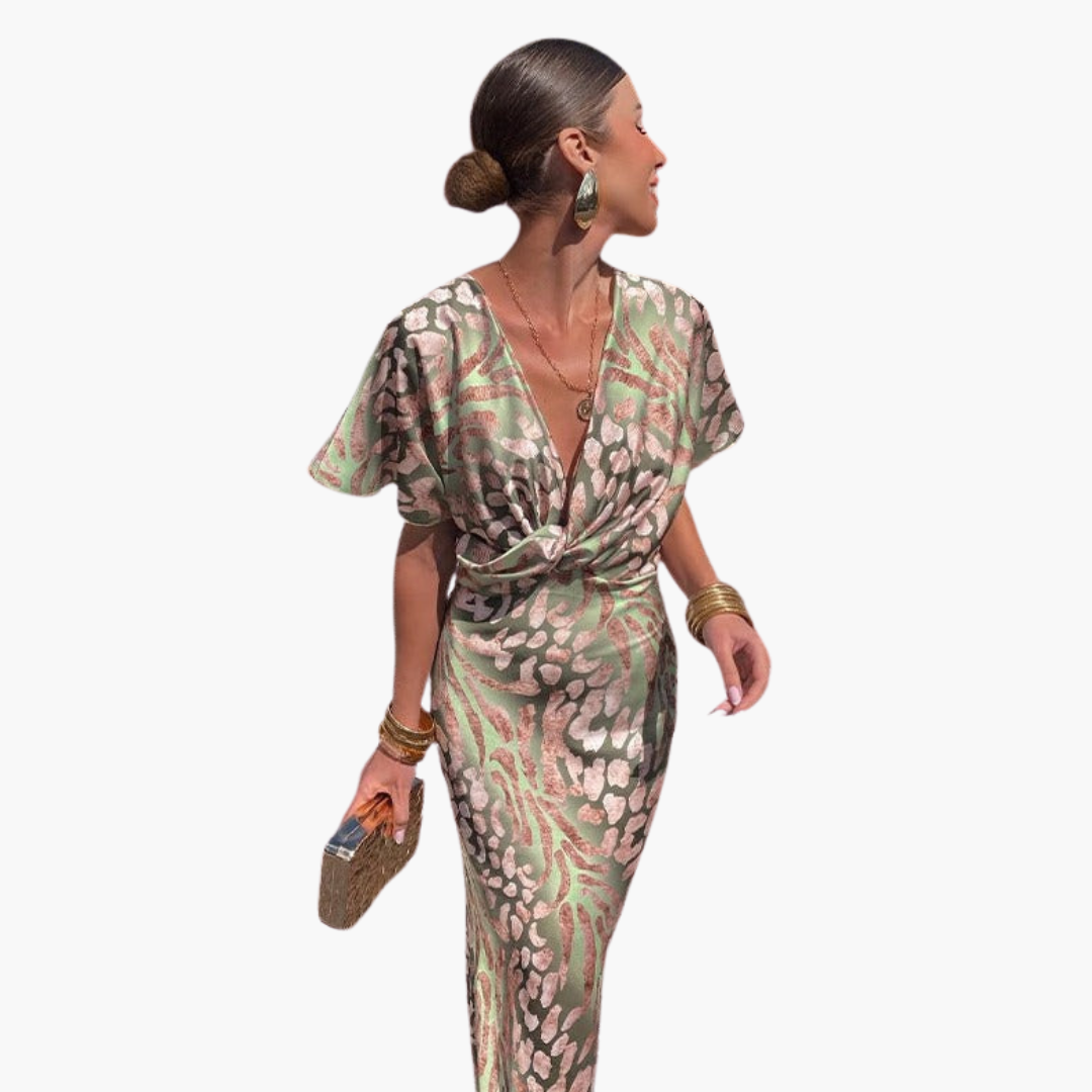 Women's ankle-length dress with V-neck and knotted front, pastel green-pink print, flutter sleeves.