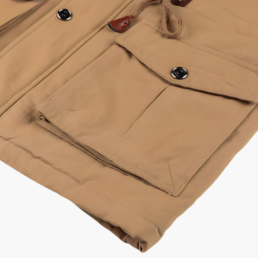 Men's Wilfred Smith tan winter jacket with front zipper and buttoned flap pockets in khaki shade tone