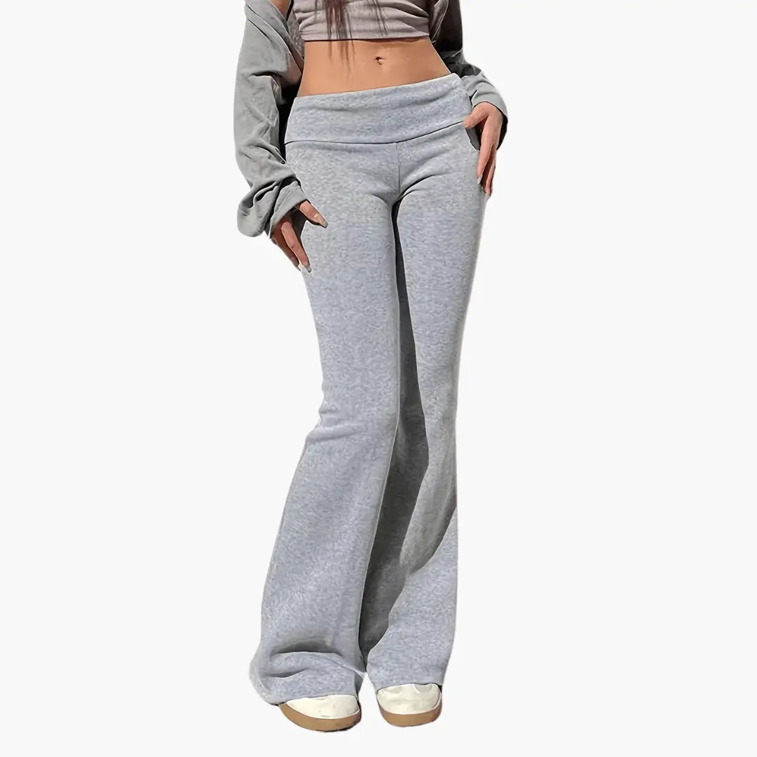Flared knitted trousers for women in light gray, high-waisted wide-leg, full-length.