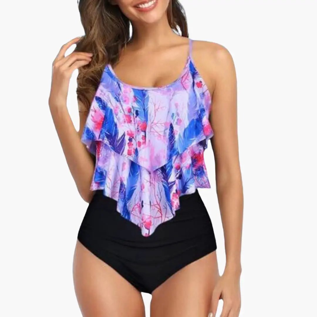 Two-piece women's tankini with ruffled pastel floral top and black high-waisted bottoms