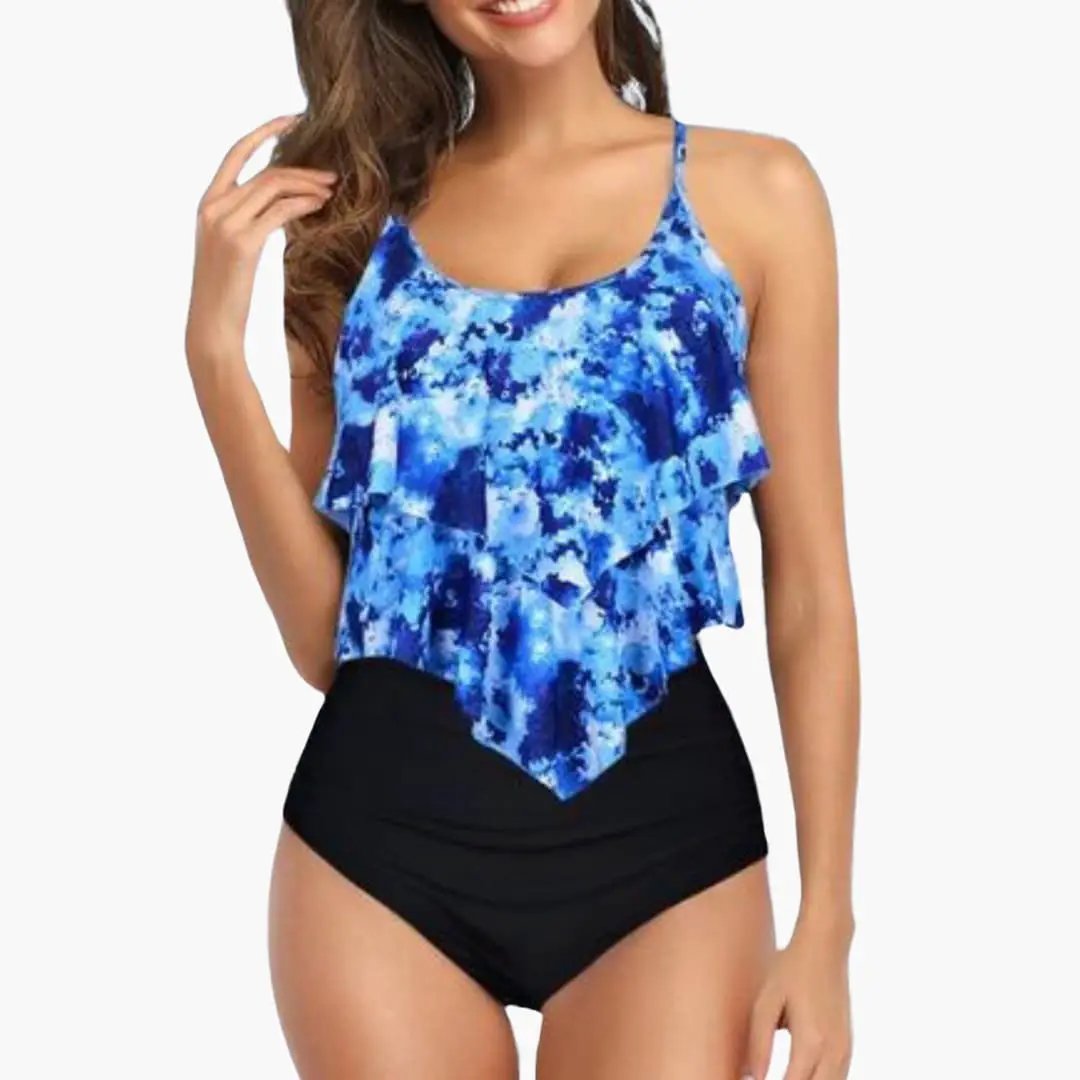 Two-Piece Wilfred Smith tankini set with blue ruffled top and black tummy-control bottoms