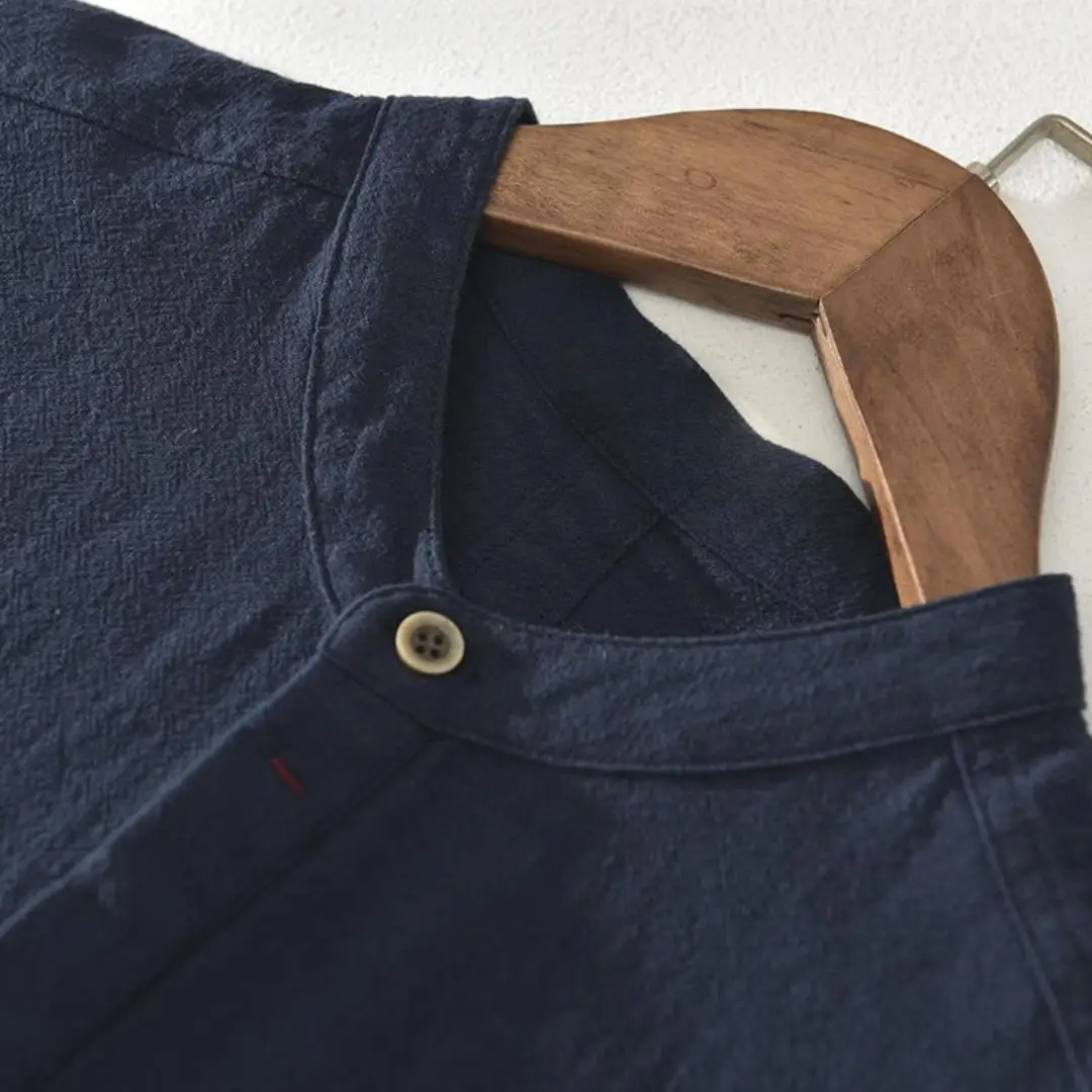 Light Short-Sleeve Shirt by Wilfred Smith, navy with stand-up collar.