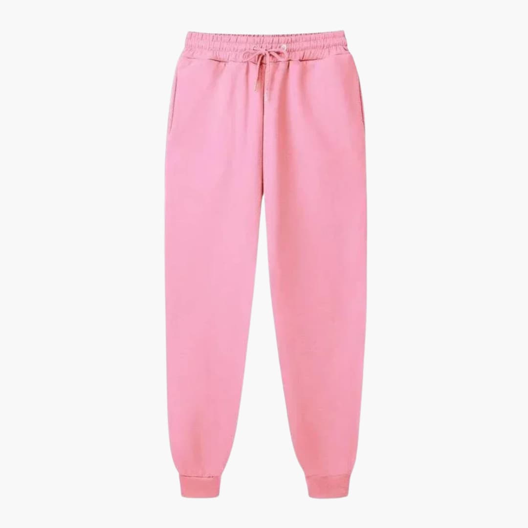 Unisex jogging pants pink by Wilfred Smith with drawstring waist and cuffed hems.