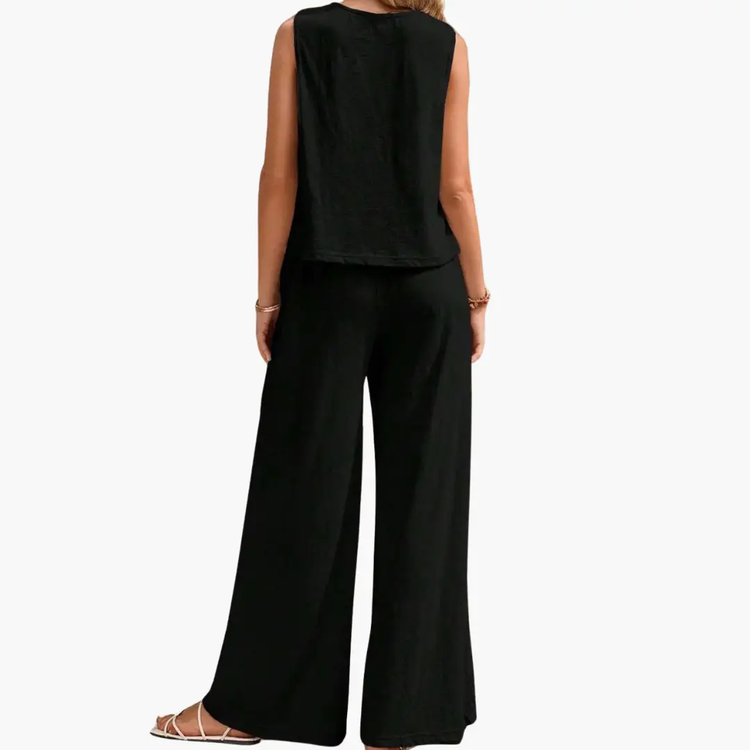 Two-piece women's outfit set by Wilfred Smith in black with sleeveless top and wide-leg pants.