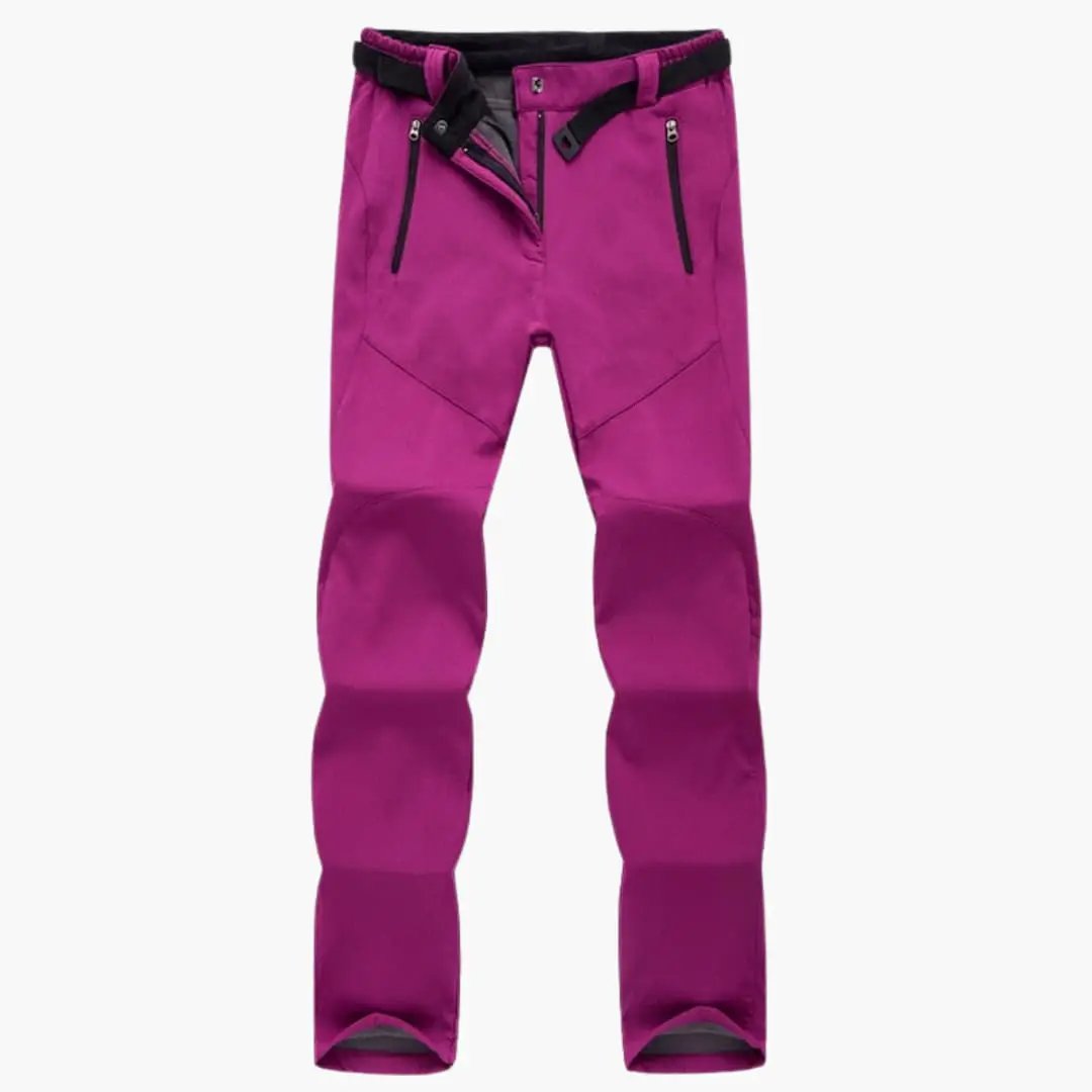 Women's hiking pants in magenta with zippered pockets by Wilfred Smith