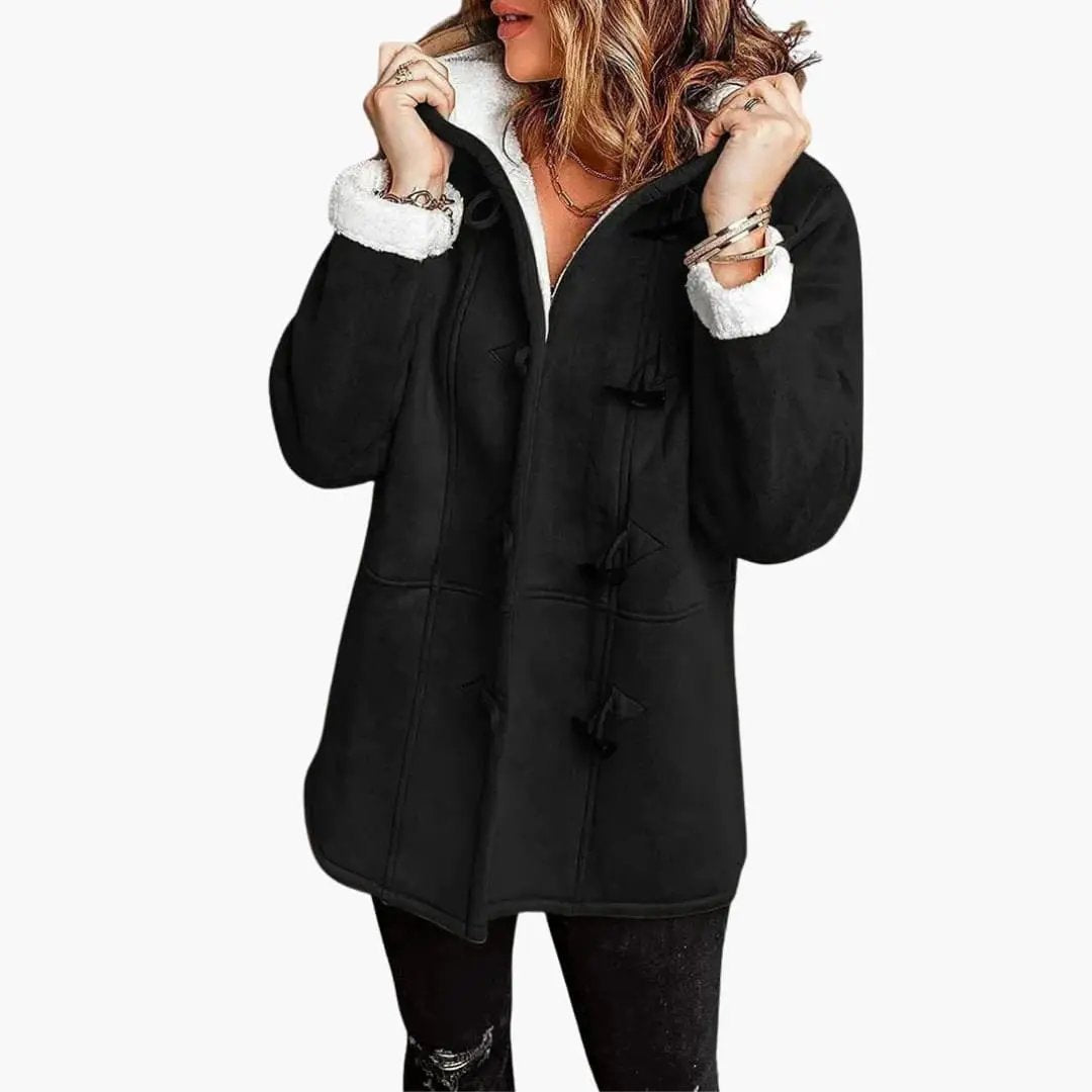 Women's black hooded jacket with toggle closures and white faux shearling cuffs