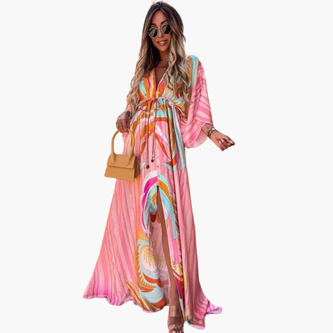 Maxi dress by Wilfred Smith with pink floral print and waist tie