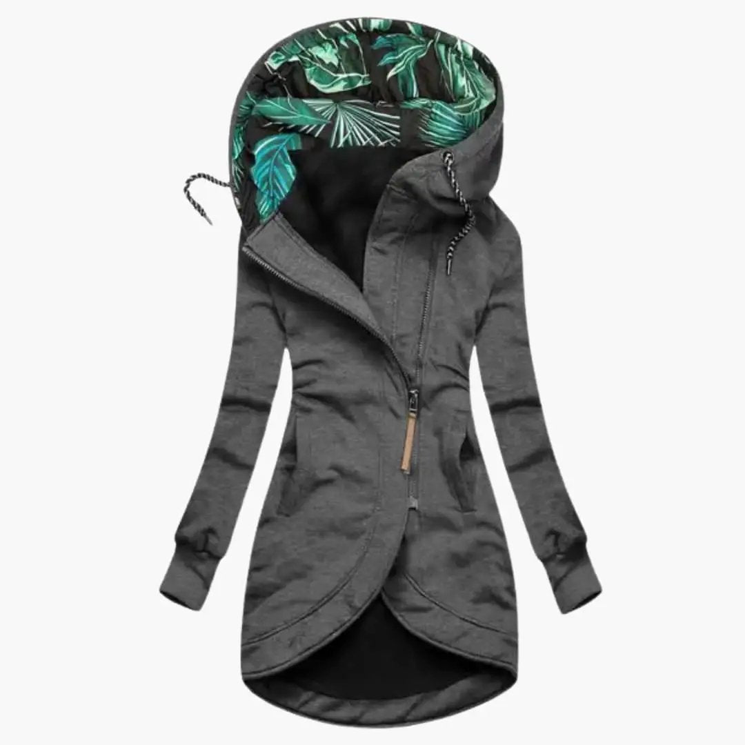 Women's Hooded Jacket by Wilfred Smith with asymmetrical zipper and front pockets; gray exterior with tropical hood