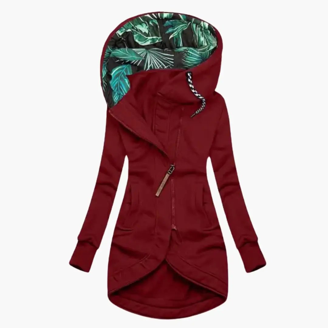 Women's burgundy hooded jacket with asymmetrical zipper, front pockets, and tropical leaf-lined hood.