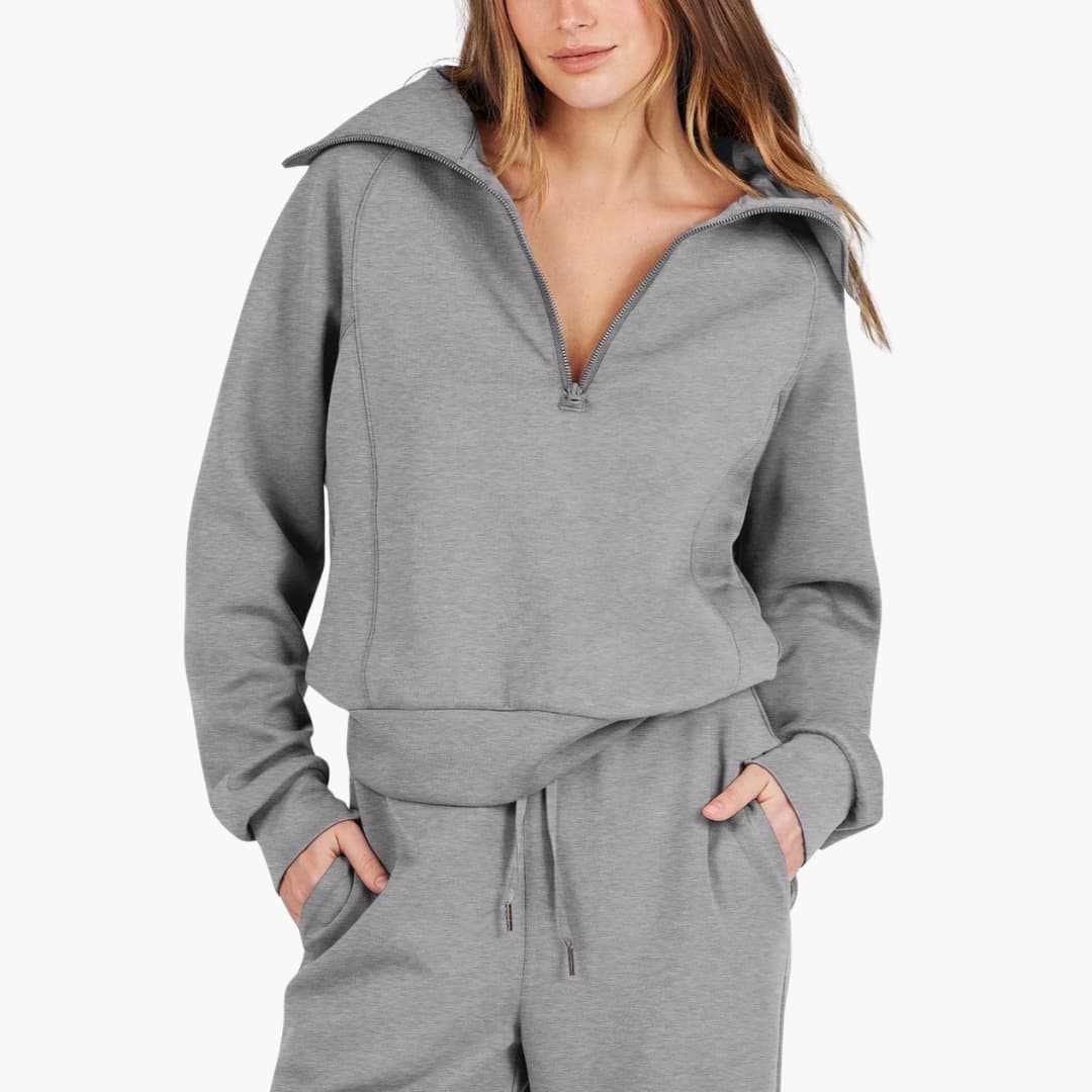 Women's two-piece lounge set by Wilfred Smith in gray, half-zip top and wide-leg pants