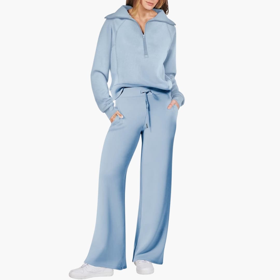 Women's lounge set with half-zip top and wide-leg pants in light blue by Wilfred Smith