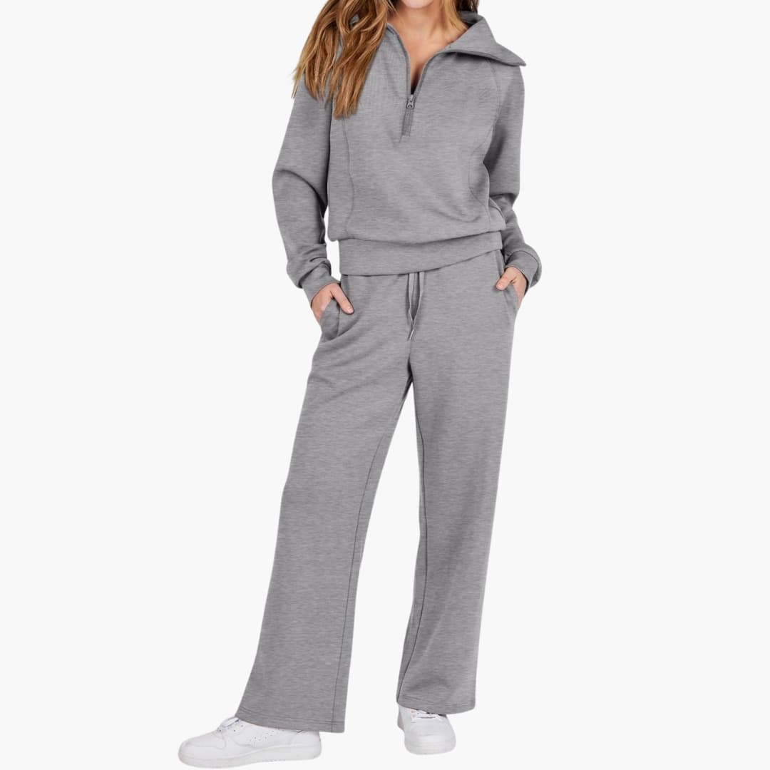 Women's gray two-piece lounge set with half-zip top and wide-leg pants