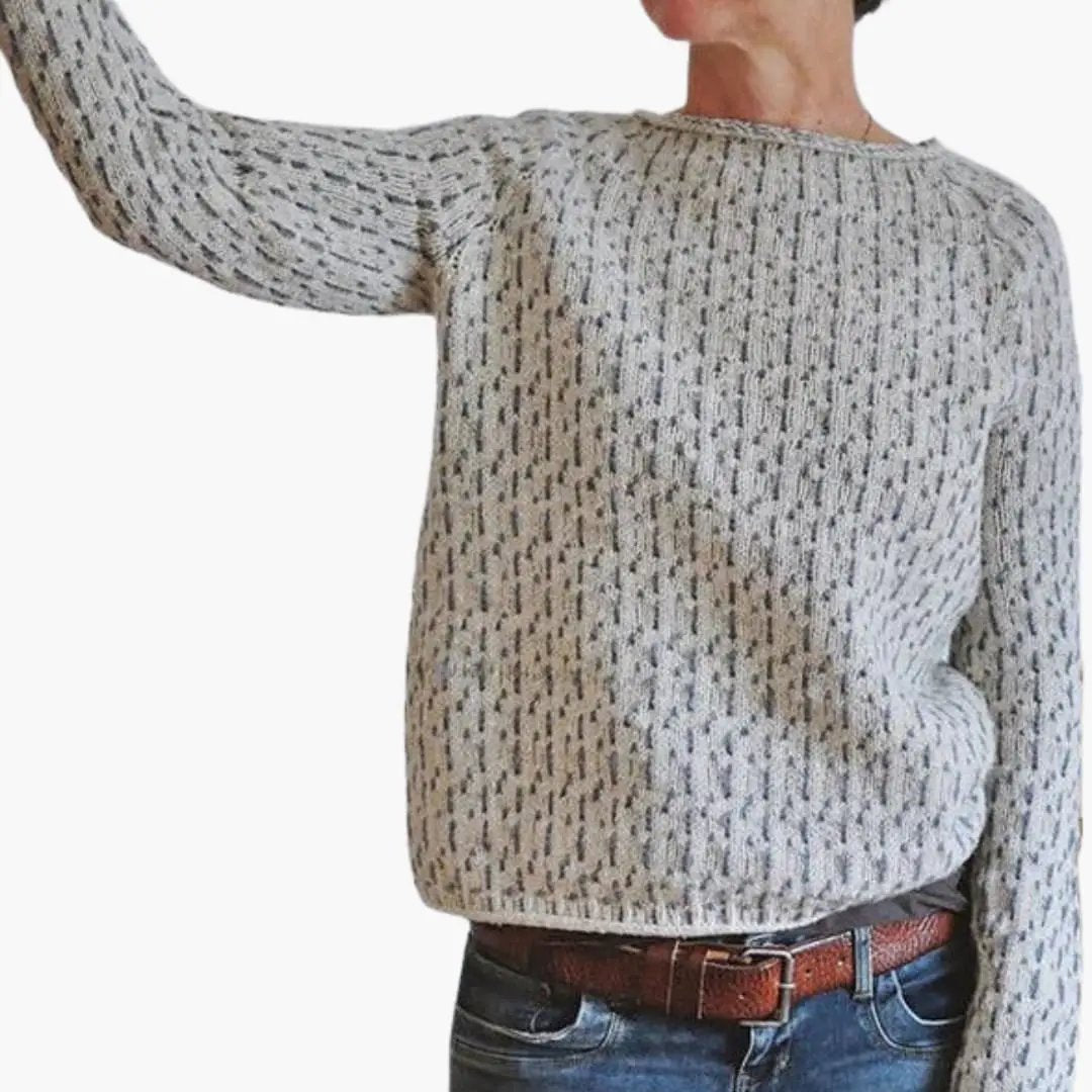 Women's round-neck knit sweater pullover in heather gray worn by a model.