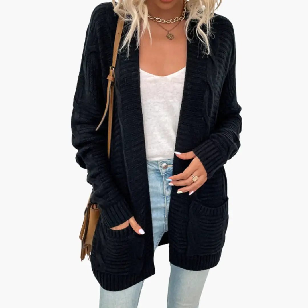 Women’s Cardigan by Wilfred Smith, black knit, open-front with long sleeves and pockets.