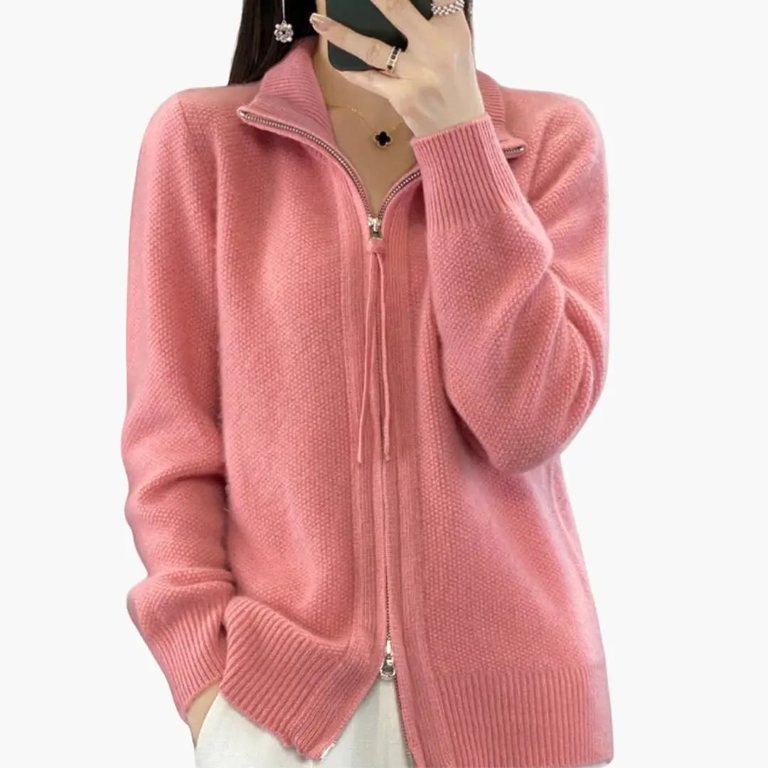 Women's pink knit zip-up cardigan with stand collar and ribbed cuffs