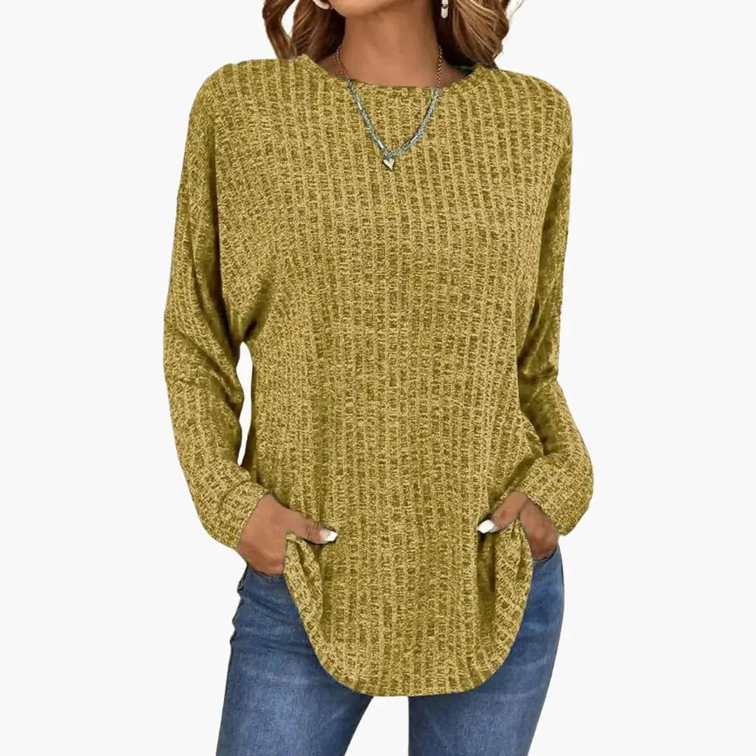 Women's Knit Sweater with Ribbed Surface in mustard yellow; long sleeves, tunic-length with front pockets.