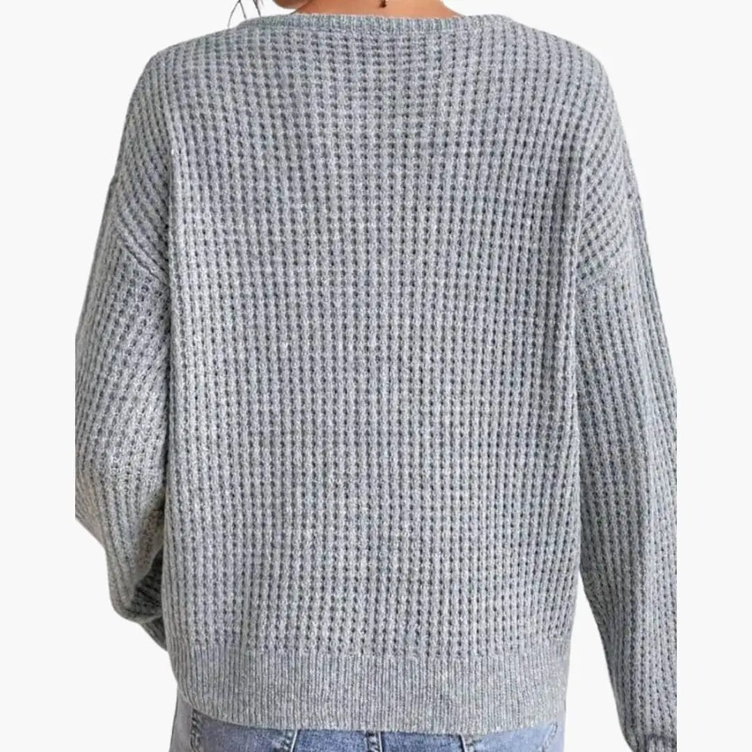 Women's gray waffle-knit pullover with long sleeves and ribbed hem (back view)