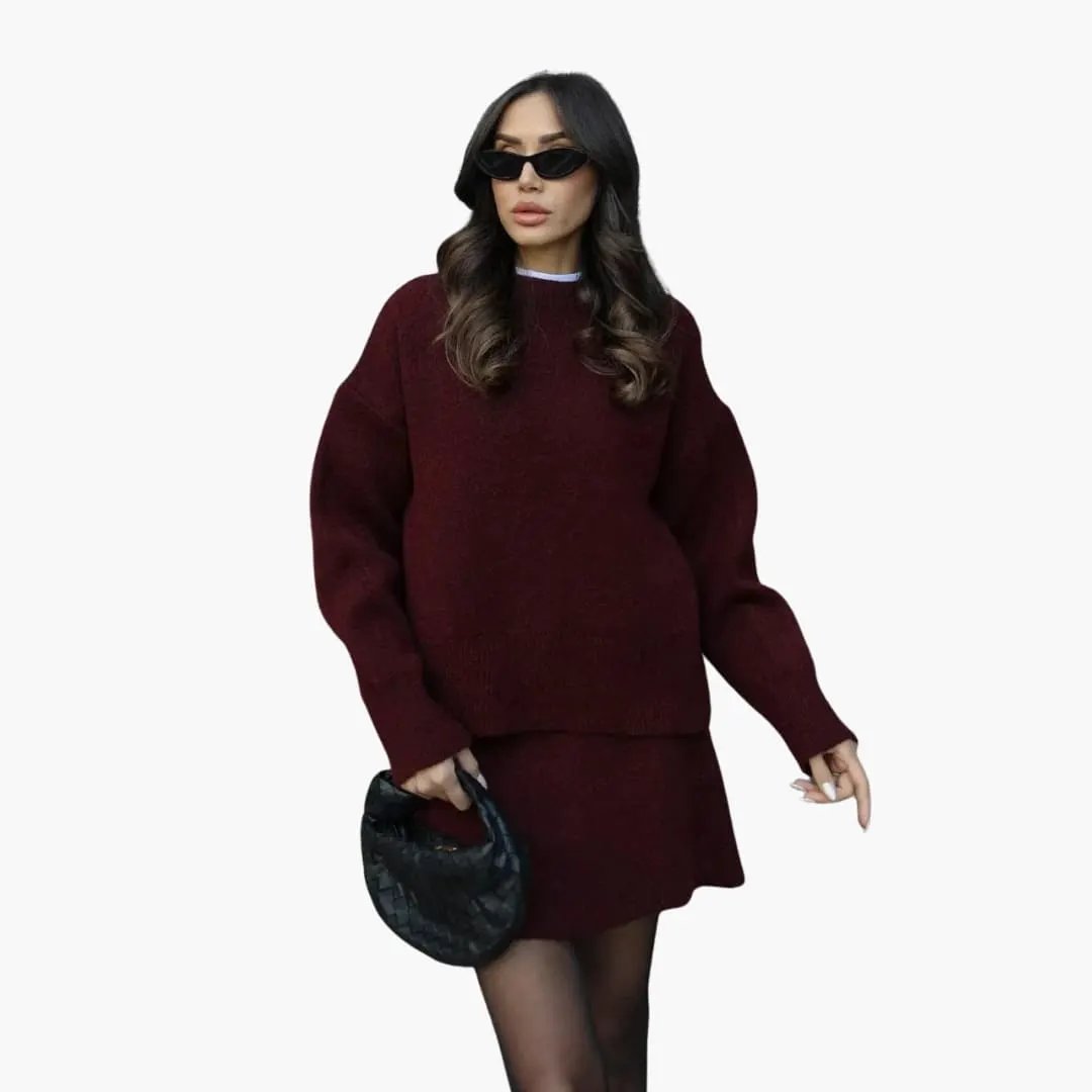Women's two-piece knit set in burgundy with round-neck sweater and matching skirt