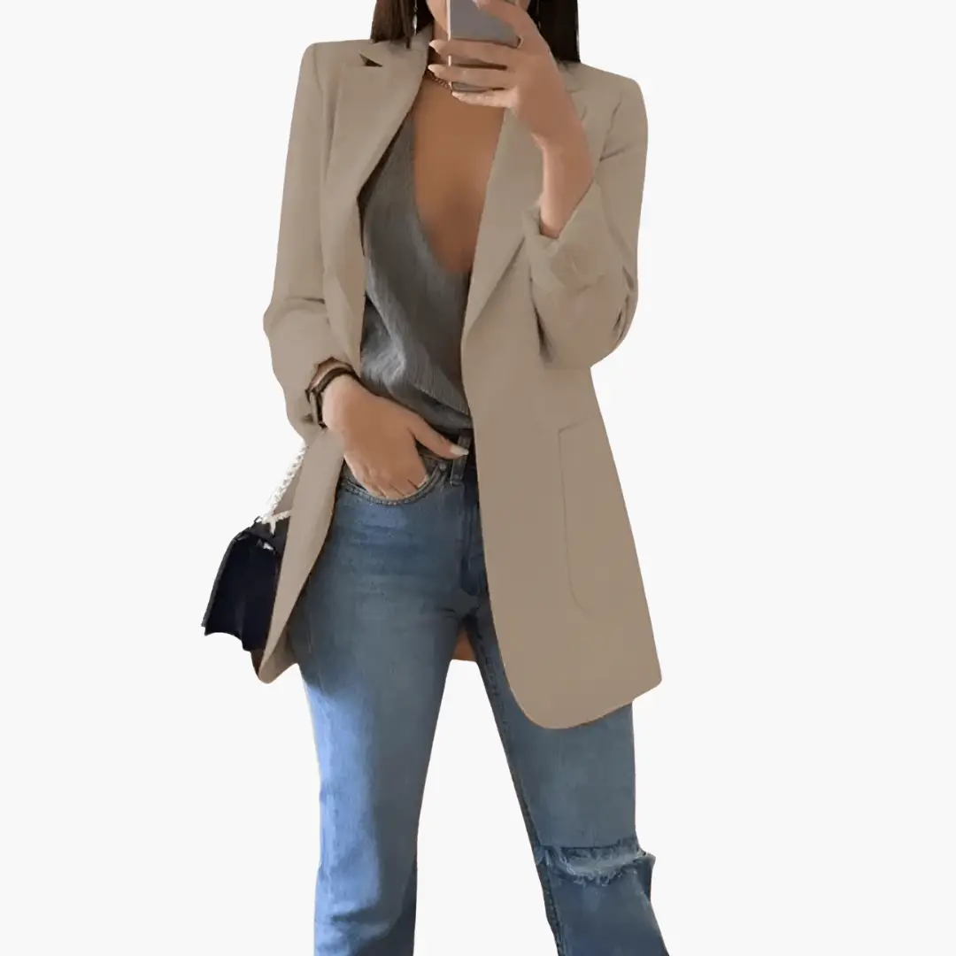 Women’s beige blazer with open front and long sleeves by Wilfred Smith.