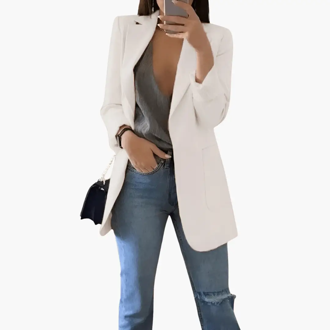 Women’s blazer by Wilfred Smith, light beige open-front blazer with long sleeves and front pockets.