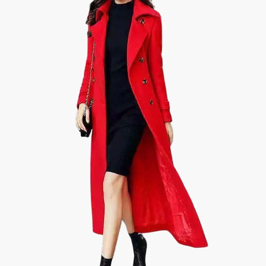 Women's long coat with shawl collar and waist belt in red, worn over black outfit.
