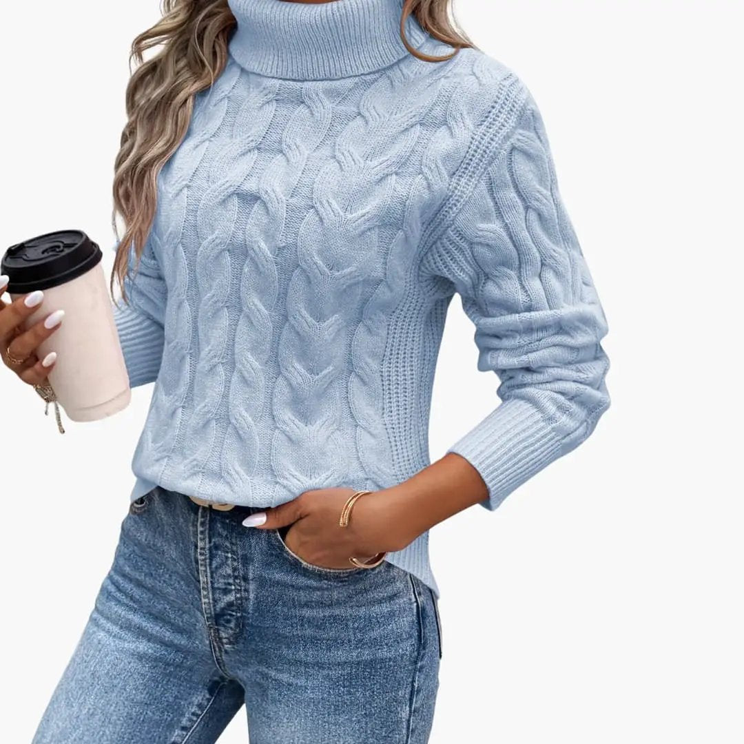 Women's light blue cable-knit turtleneck sweater by Wilfred Smith