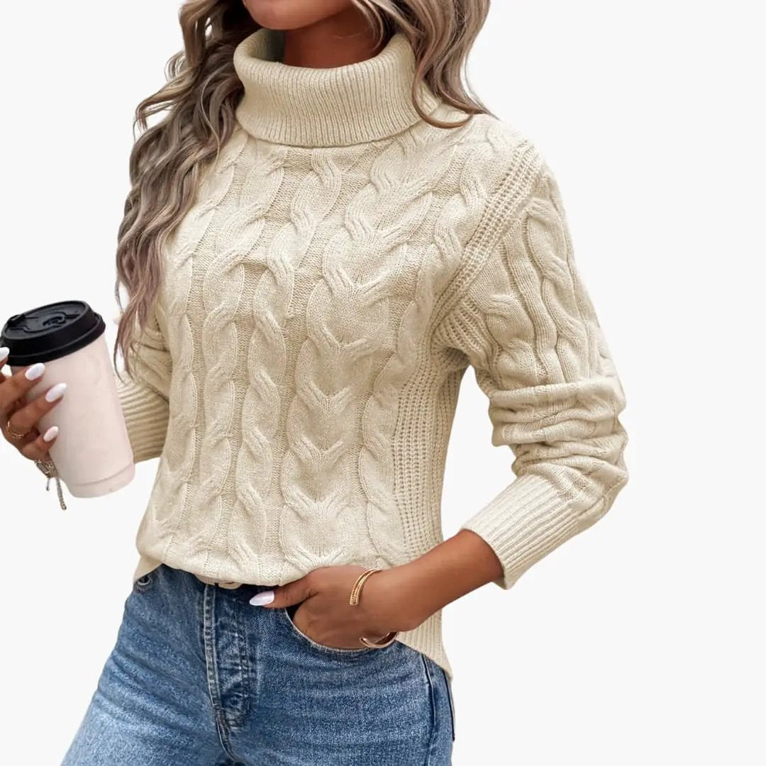 Women's cream cable-knit turtleneck sweater by Wilfred Smith; long sleeves, chunky knit.