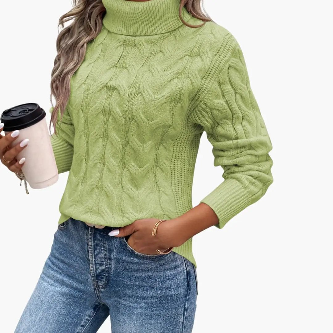 Women's lime-green cable-knit turtleneck sweater worn by a model