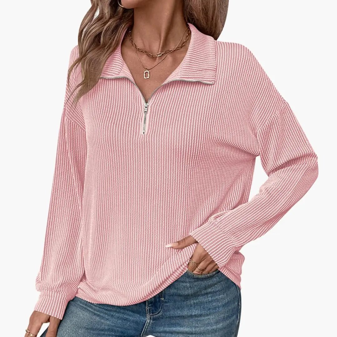 Women's pink striped pullover with half zipper at neckline