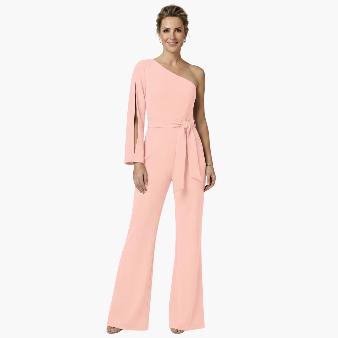 Elegant jumpsuit for women in peach with a one-shoulder neckline, belt tie, wide legs by Wilfred Smith.