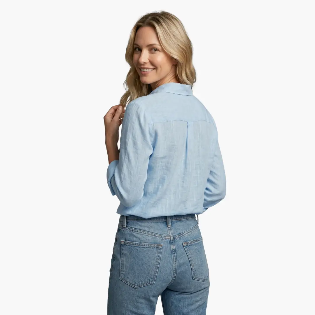 Elegant long sleeve shirt for women by Wilfred Smith in light blue, back view