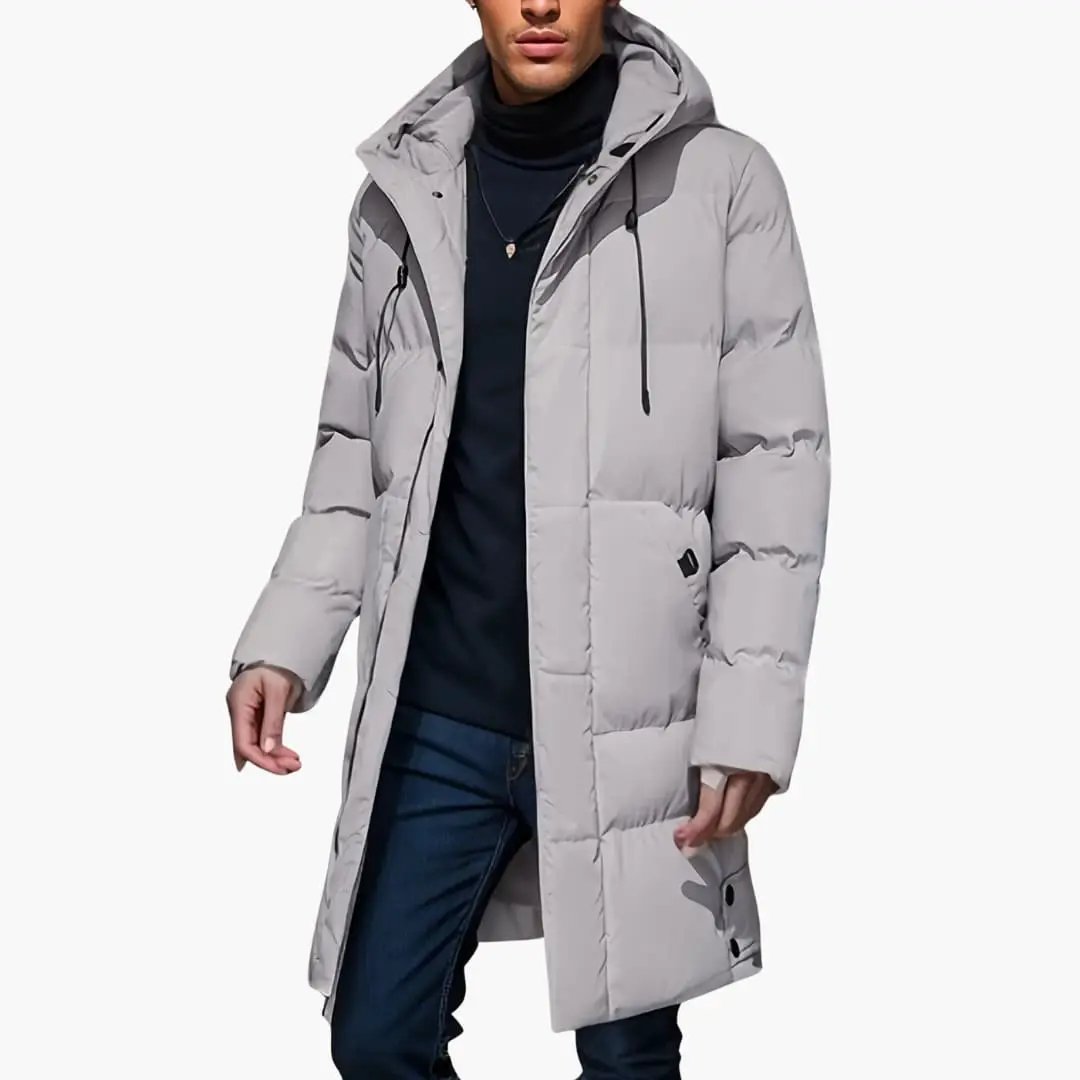 Men's long gray puffer jacket with adjustable hood, front pockets, and quilted panels