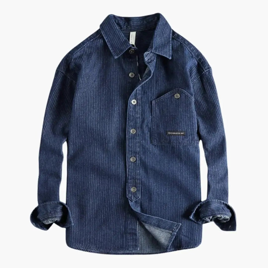 Men's utility shirt by Wilfred Smith in blue corduroy with chest pocket and snap-button closure