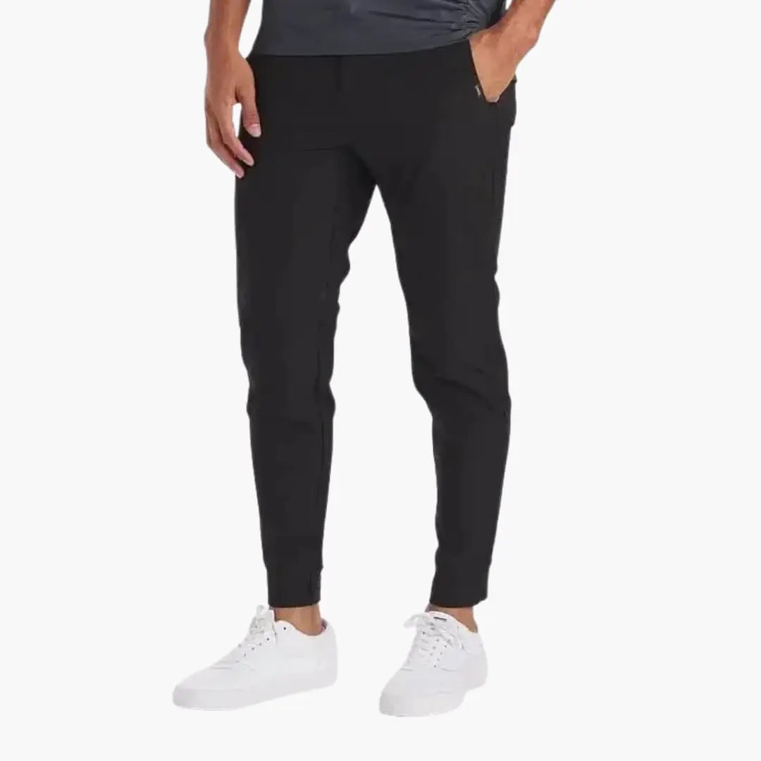 Men's black pants with stretch waistband and tapered legs by Wilfred Smith