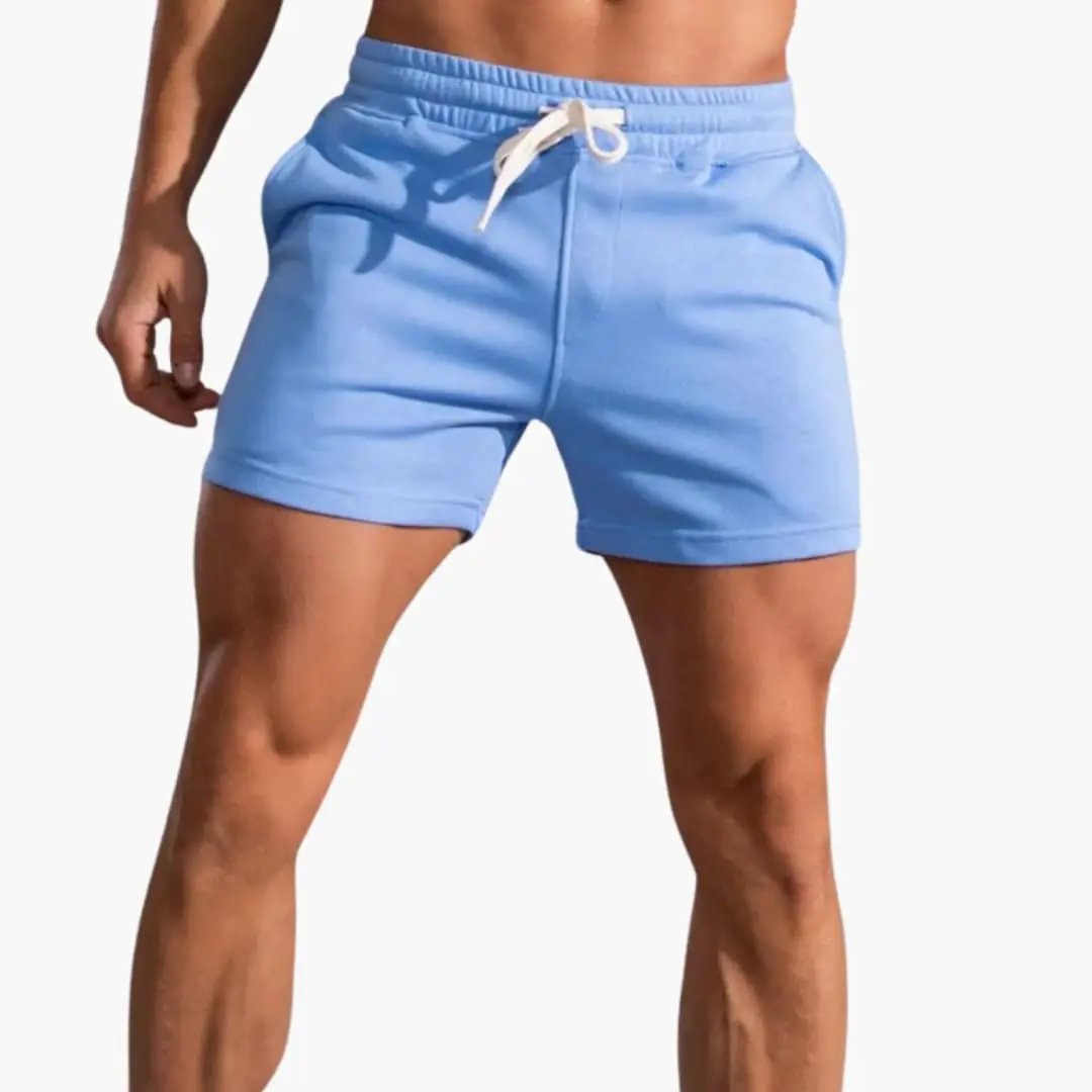 Men's above-knee shorts by Wilfred Smith with elastic waistband and drawstring in light blue