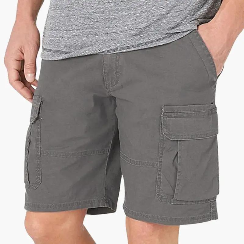 Men's cargo shorts by Wilfred Smith in gray, knee-length with zipper and flap pockets.