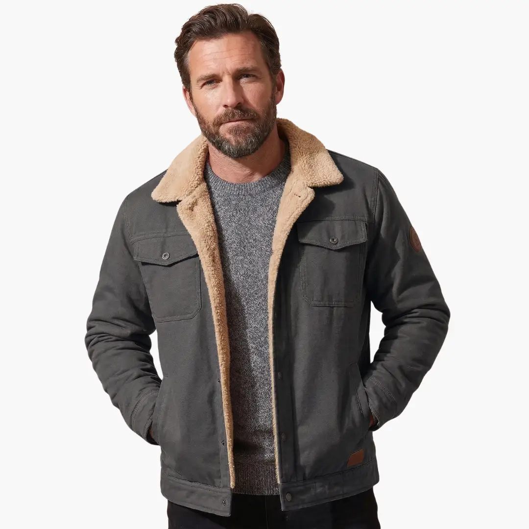 Men's trucker jacket with sherpa lining, dark gray fabric, button closure.
