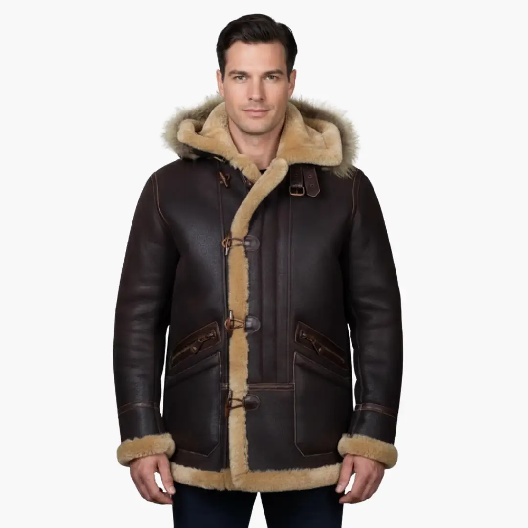 Men's dark brown leather parka with hood and tan shearling trim, toggle closures, Wilfred Smith.