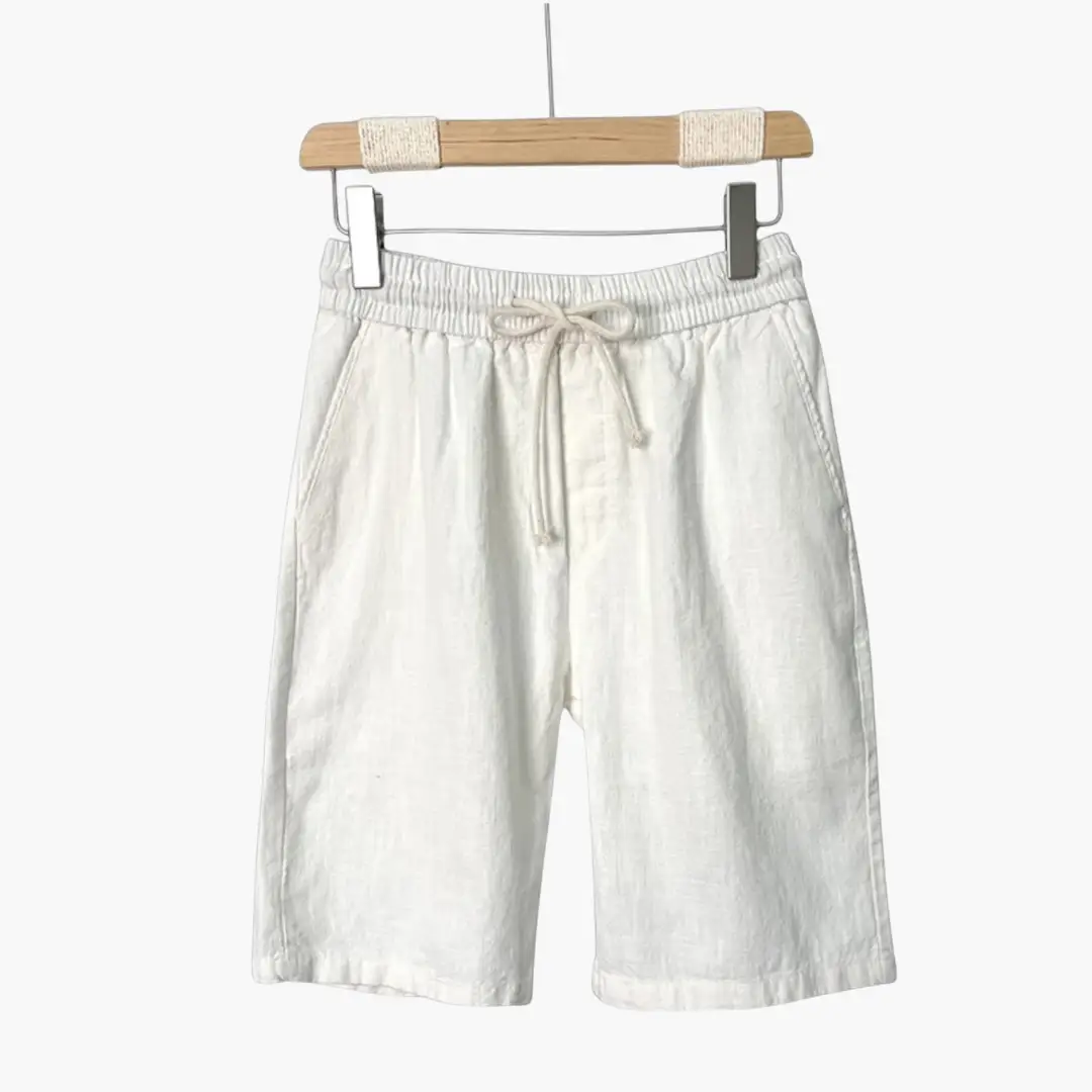 Men's linen shorts, cream with elastic waistband and side pockets, chino-style.