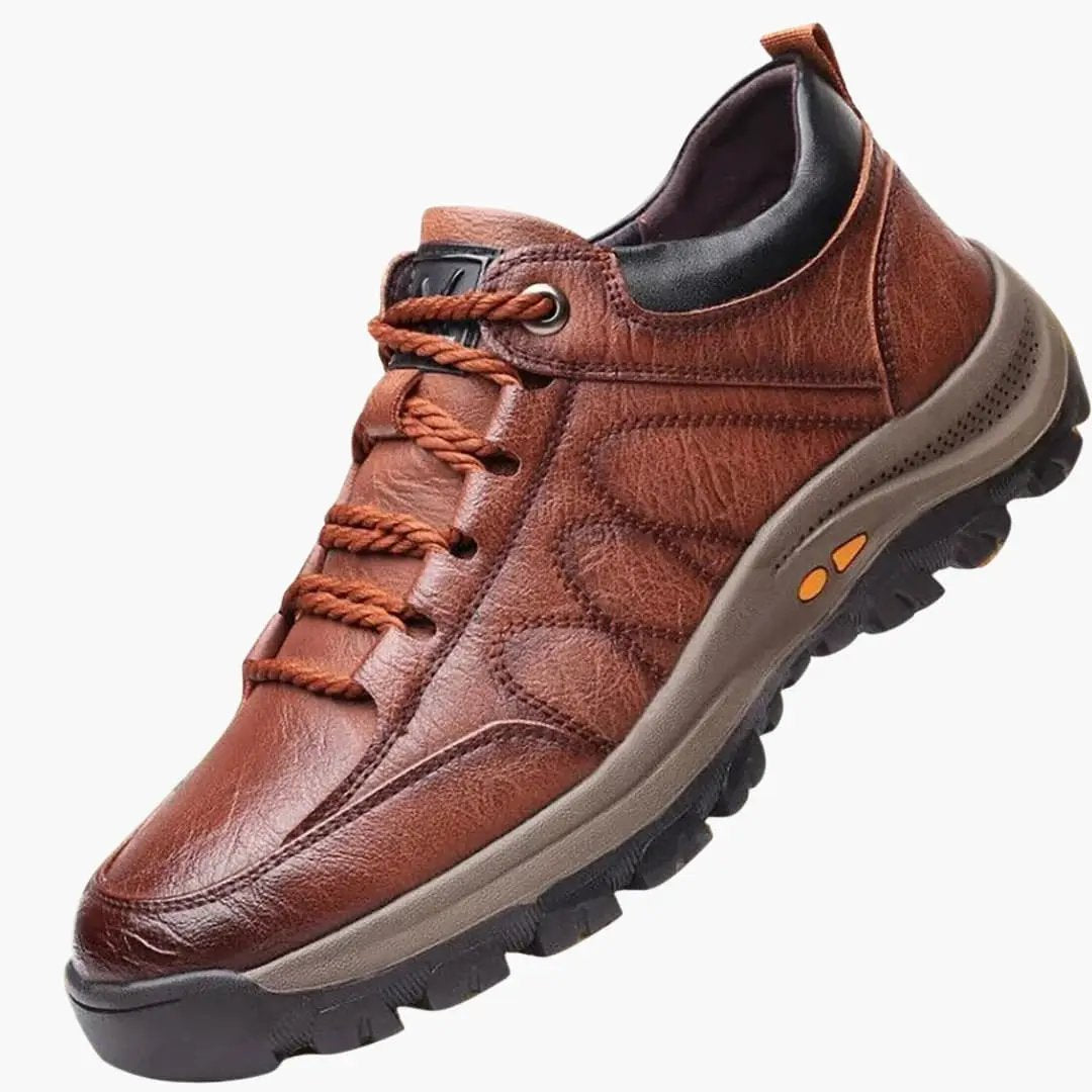 Wilfred Smith men's orthopedic athletic shoe with brown leather upper and orange laces.