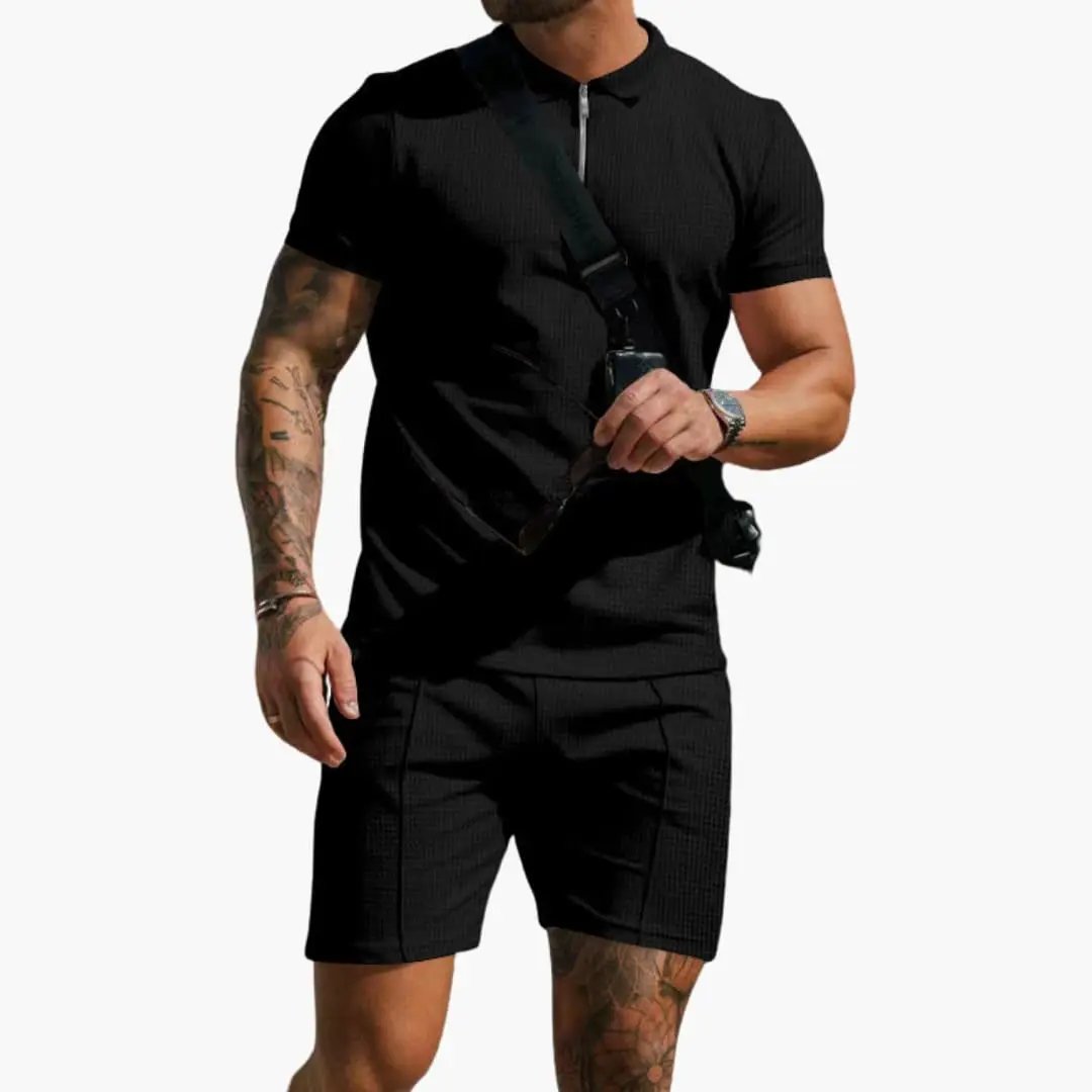 Men's polo shirt by Wilfred Smith with black textured surface and side pockets