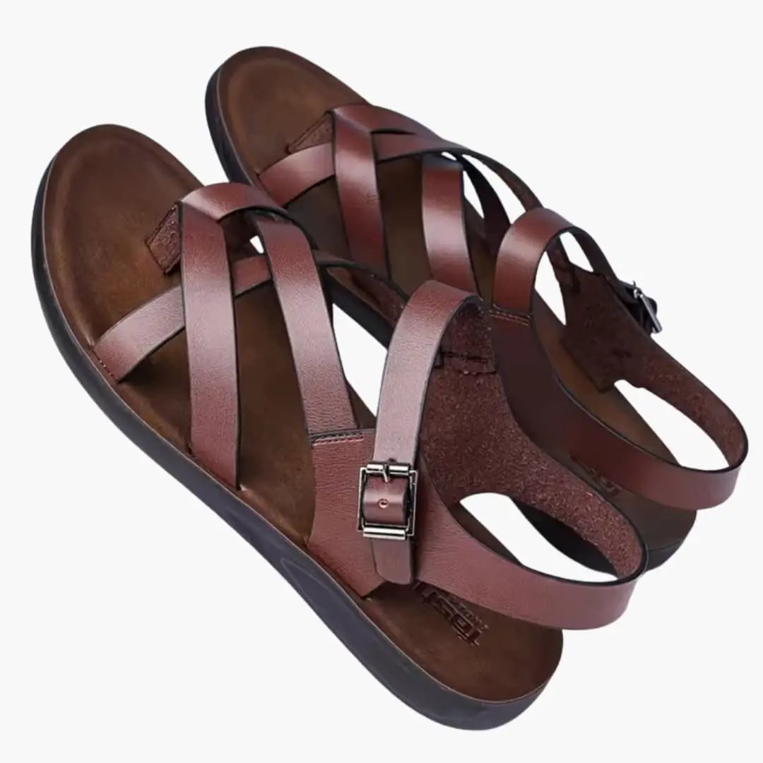 Wilfred Smith men's sandals in brown leather with cross straps and metal buckle closure, round toe