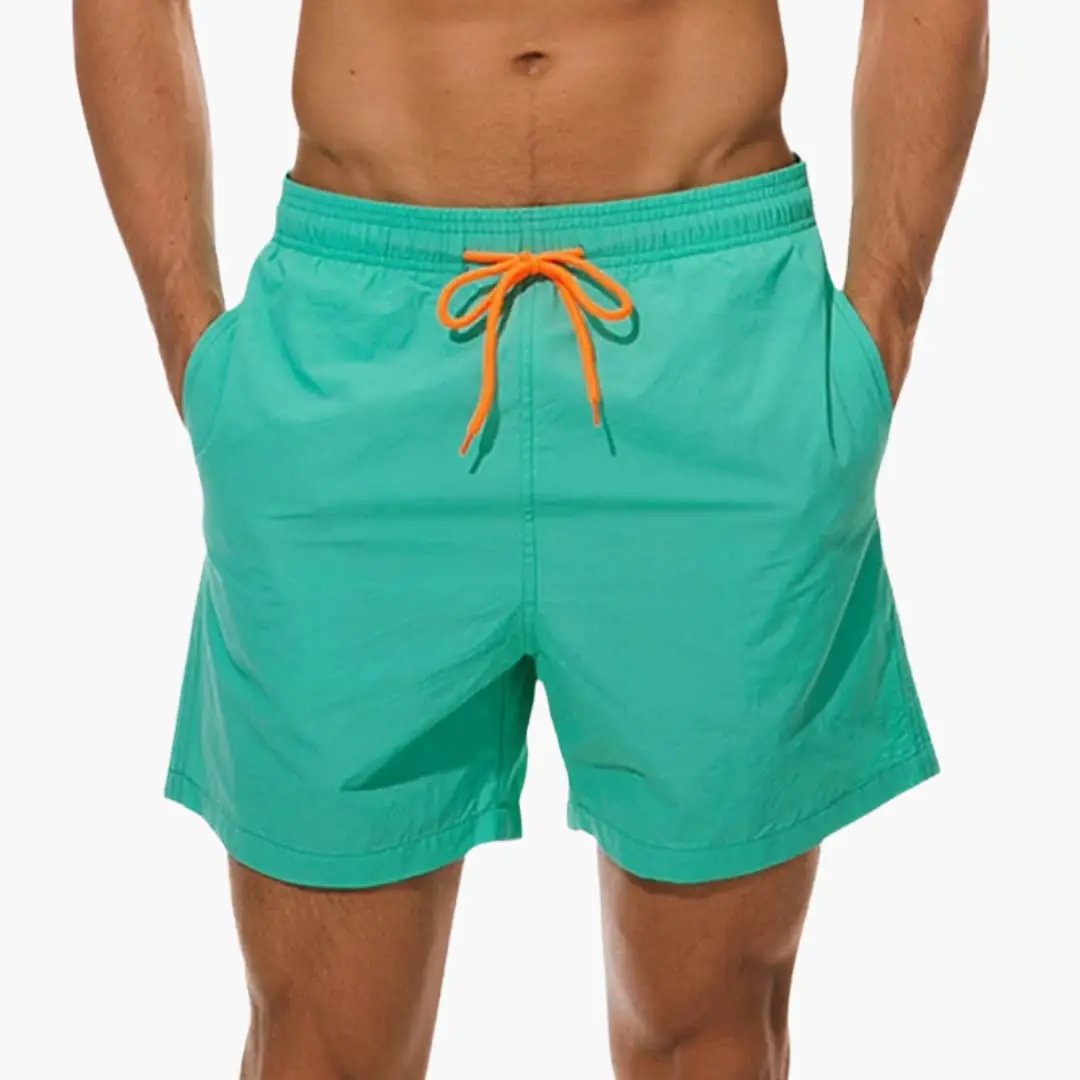Men's Jogger Shorts in teal with orange drawstring, elastic waistband, inner lining.